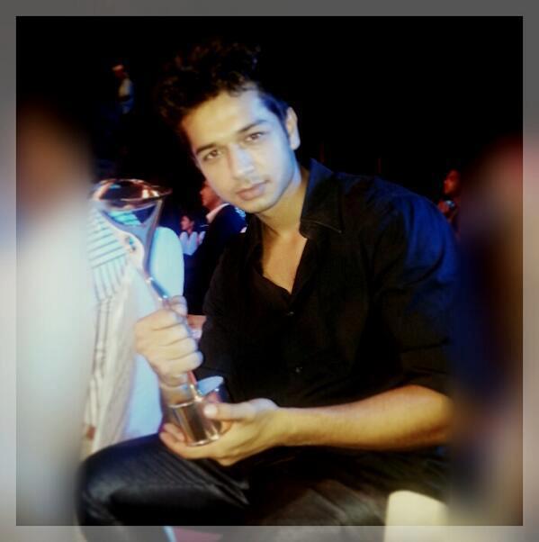 Fahad Ali with his award