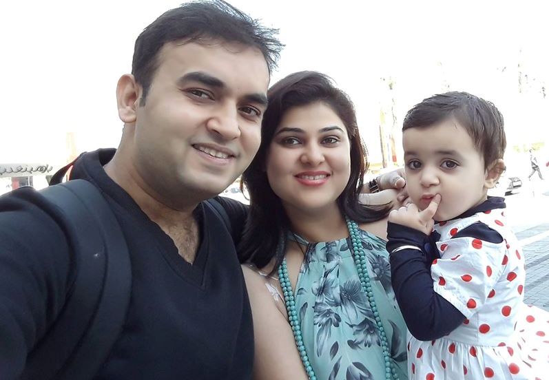Nidhi Vasandani with her husband and daughter