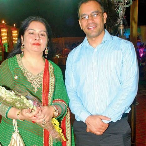 Puja Thakur Sekera with her husband