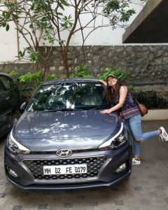 Zayn Marie Khan with her car