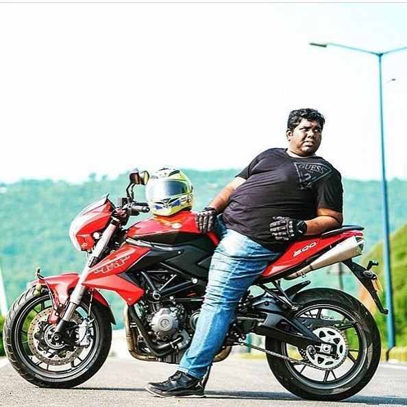 Harsha Chemudu with his bike