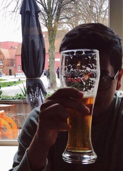 Vrishank Khanal with a glass of beer