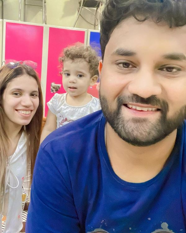Arun Srikanth Mashettey with his wife and daughter