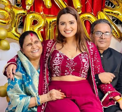 Neelam Giri with her parents